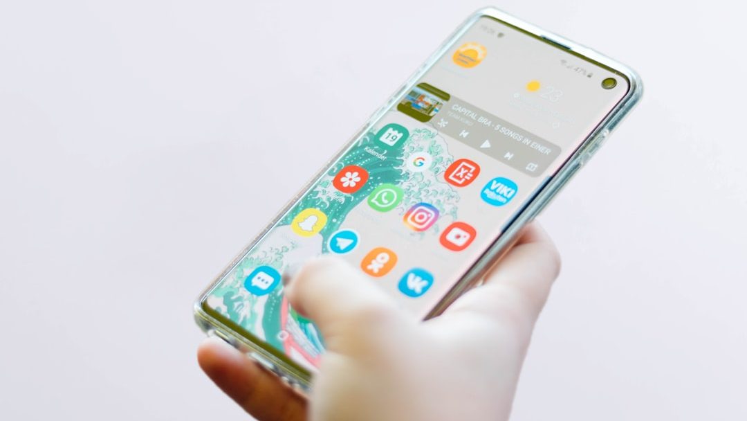 Photo by Christian Wiediger person using silver Android smartphone