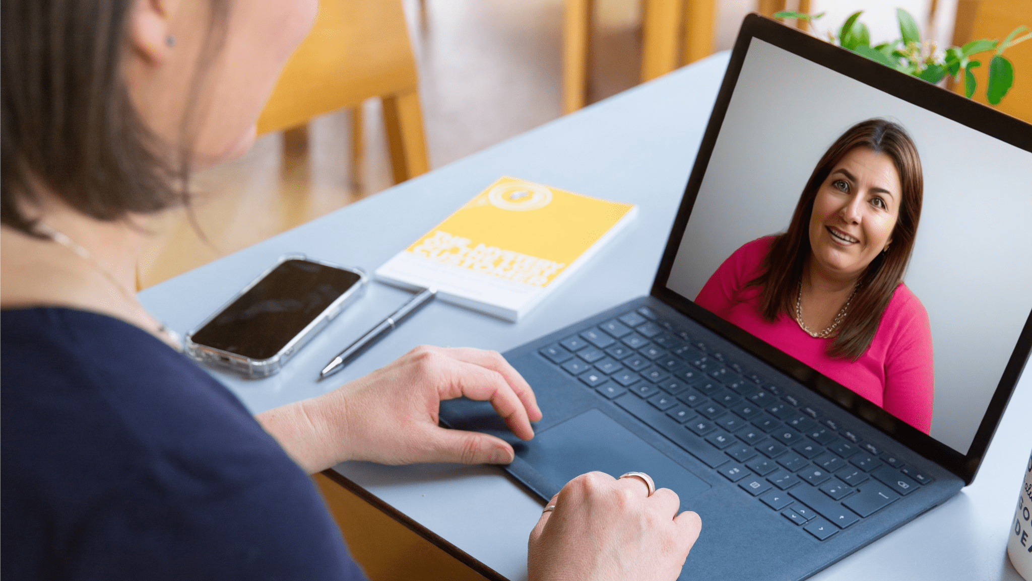 Zoom Call Photo of Susannah Simmons sat at laptop